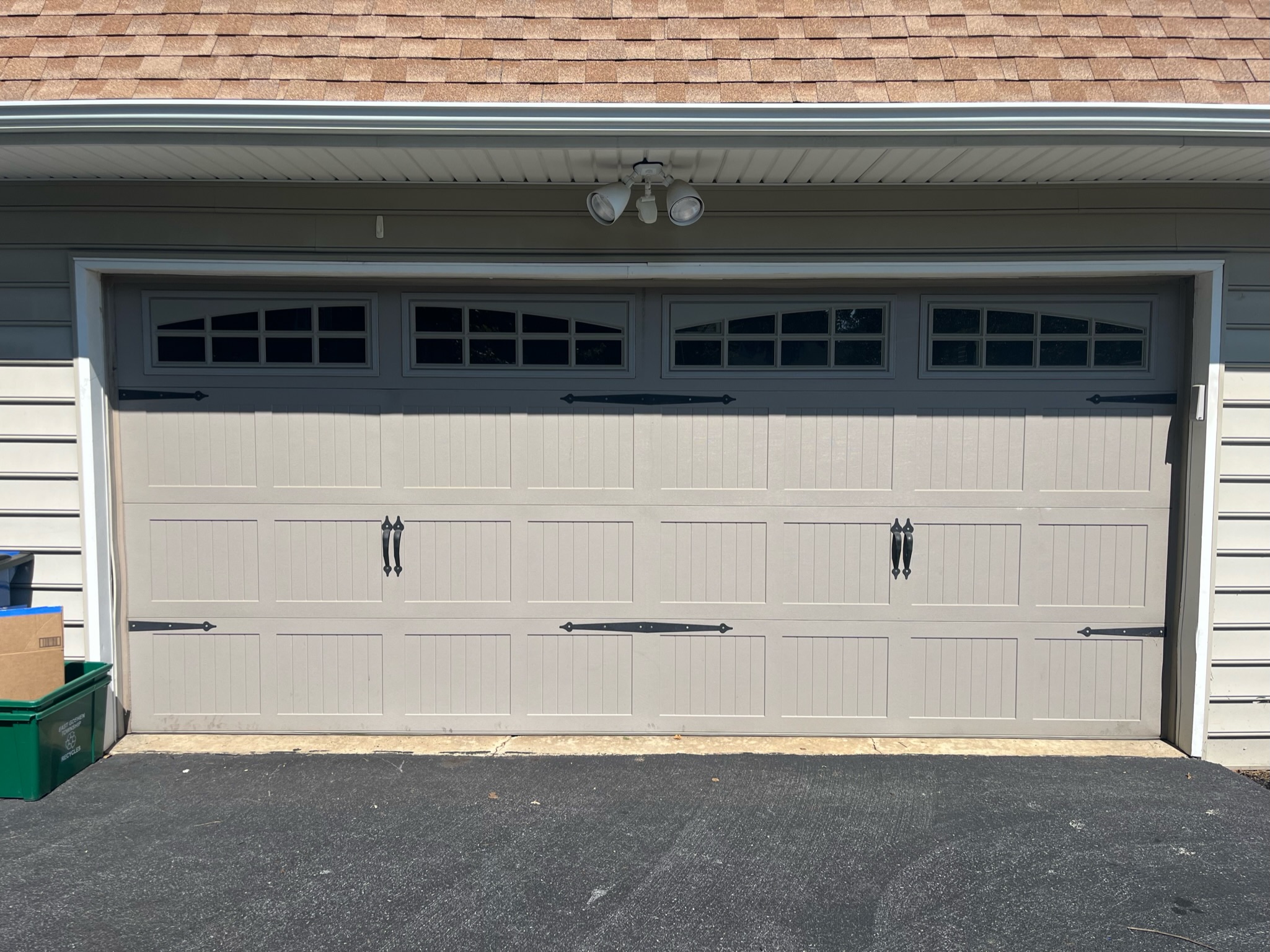 You are currently viewing What To Do If You Accidentally Backed Up Into Your Garage Door: Why Hidden Valley Doors is Your Go-To Solution